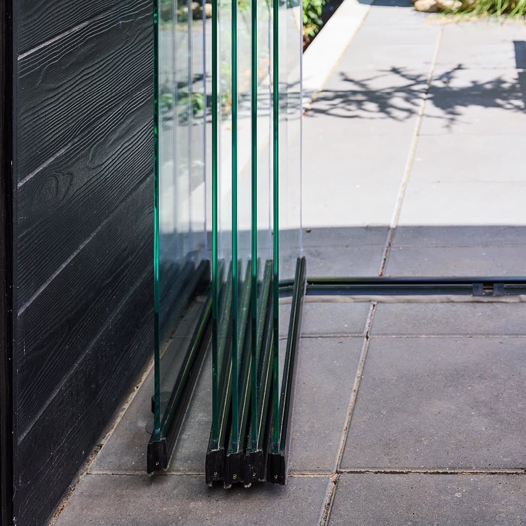 Vertical glass panel stack close-up