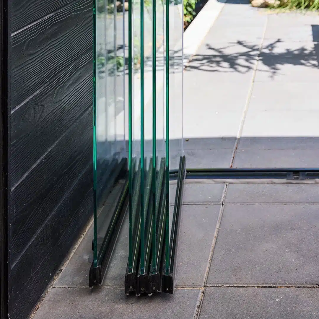 Vertical glass panel stack close-up