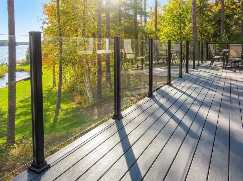 Enjoy unobstructed lake views with topless glass railings designed for cottage living.