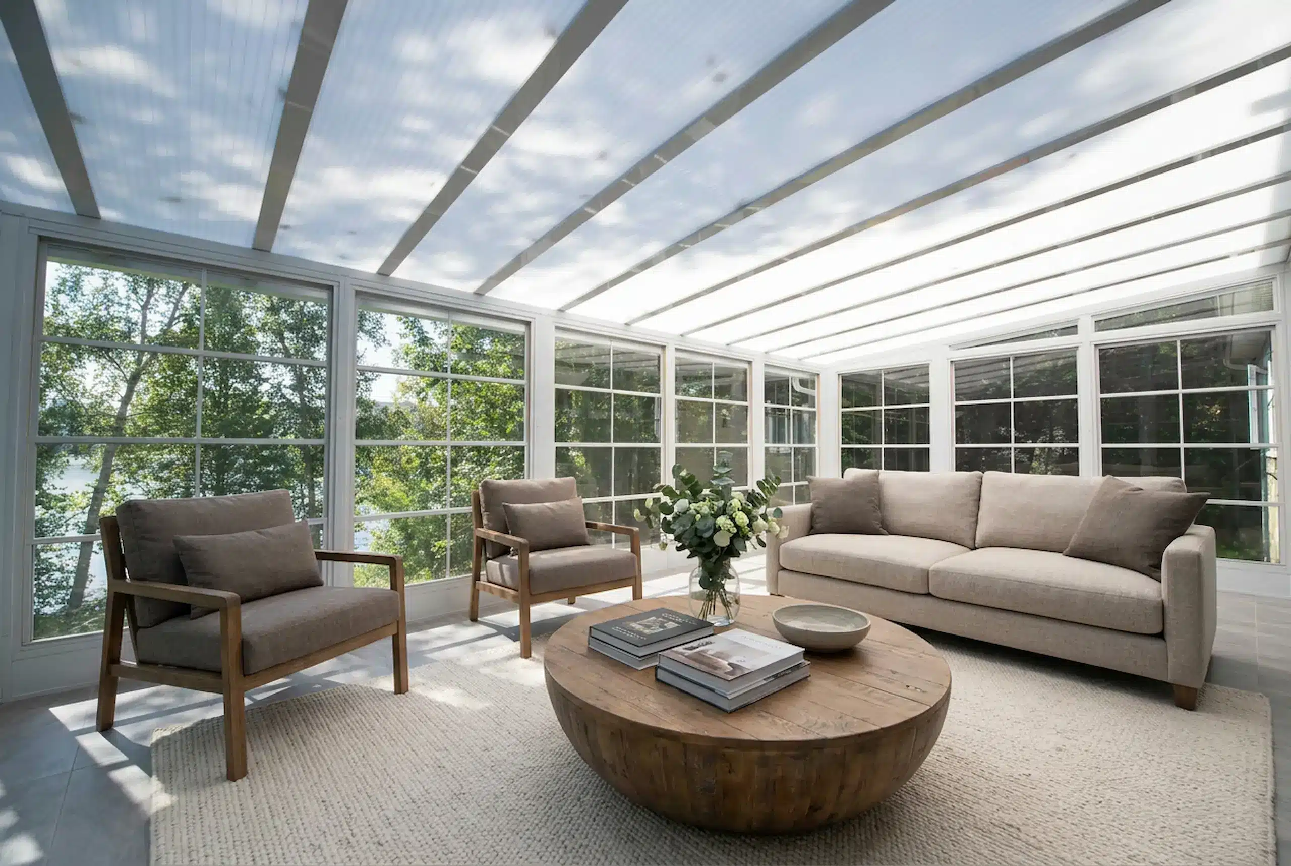 3-season vinyl sunroom with open windows for better summer airflow.