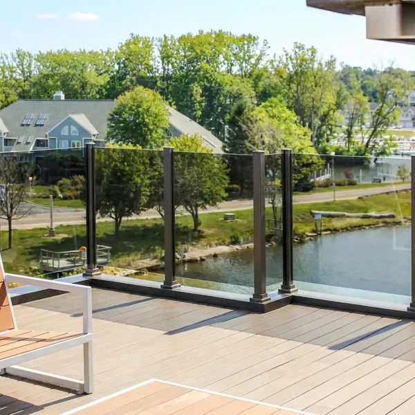 Enjoy unobstructed lake views with topless glass railings designed for cottage living.
